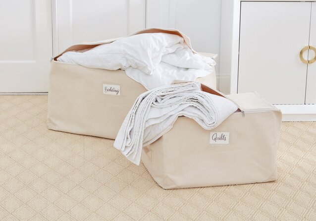 Cleaning Mohair: The Ultimate Guide to Care and Maintenance 2 Two beige storage bags labeled