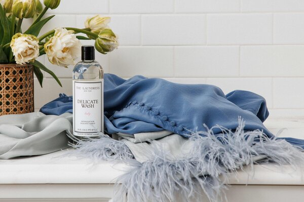 the laundress delicate wash on counter with silk clothes the laundress delicate wash on counter with silk clothes