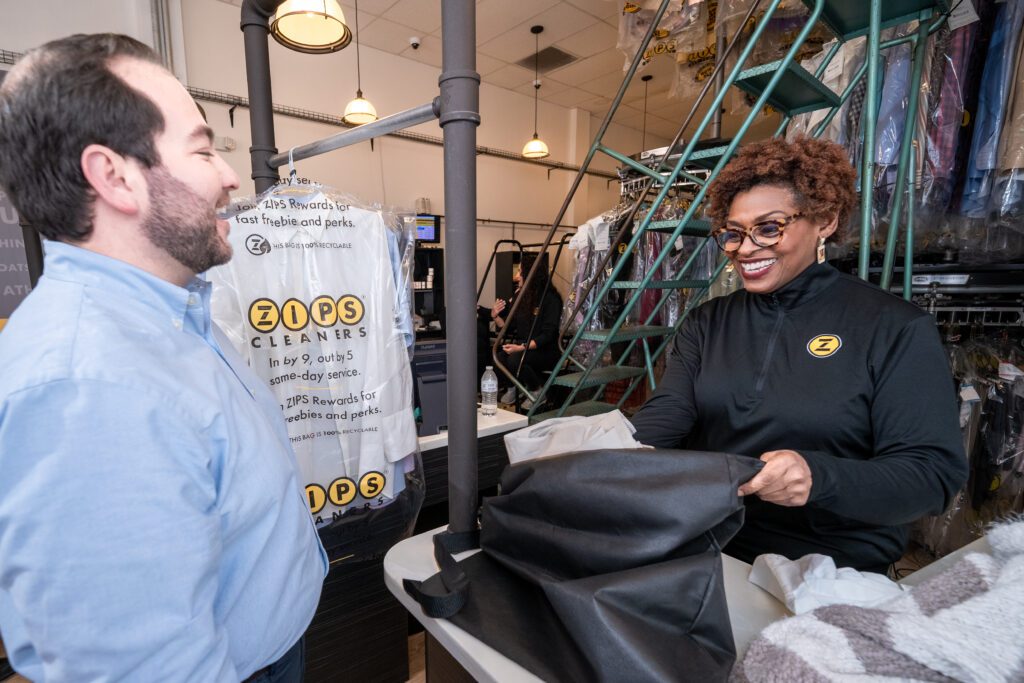 dsc06833-1024x683-1 A ZIPS associate providing excellent customer service.